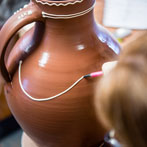 Doug Fitch and Hannah McAndrew making a jug for me